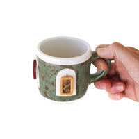 Framed Figures Mug by Annette Janelle