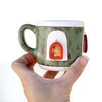 Framed Figures Mug by Annette Janelle