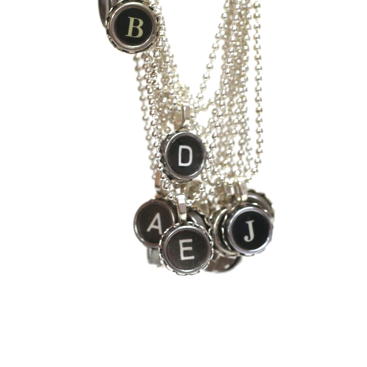 Typewriter Key Pendants by Sara Sacks