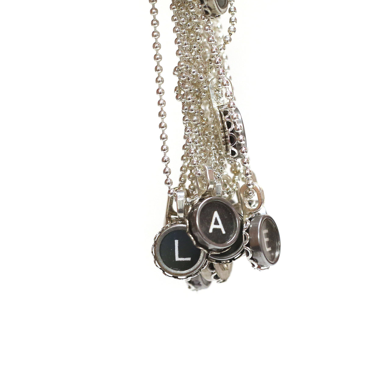 Typewriter Key Pendants by Sara Sacks