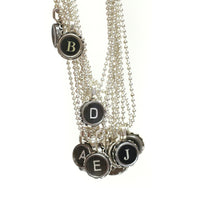 Typewriter Key Pendants by Sara Sacks