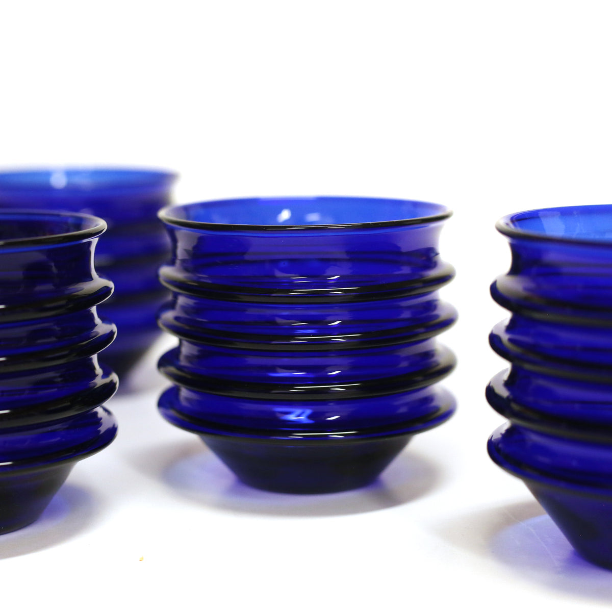 Stackable drinking glasses by Primitive Glass
