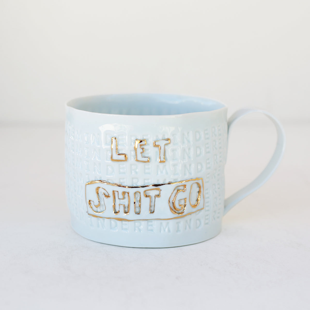 'Let Shit Go' Mug by Stepanka Summer