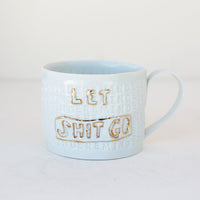 'Let Shit Go' Mug by Stepanka Summer