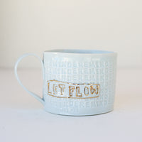 'Let Shit Go' Mug by Stepanka Summer
