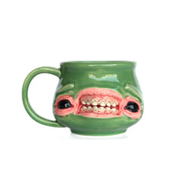 Face Mug by Tom Olejar