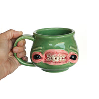 Face Mug by Tom Olejar