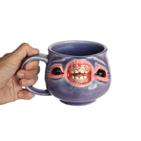 Face Mug by Tom Olejar