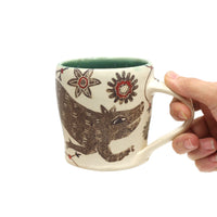 Pigs and Flowers Mug by Paula Weiss